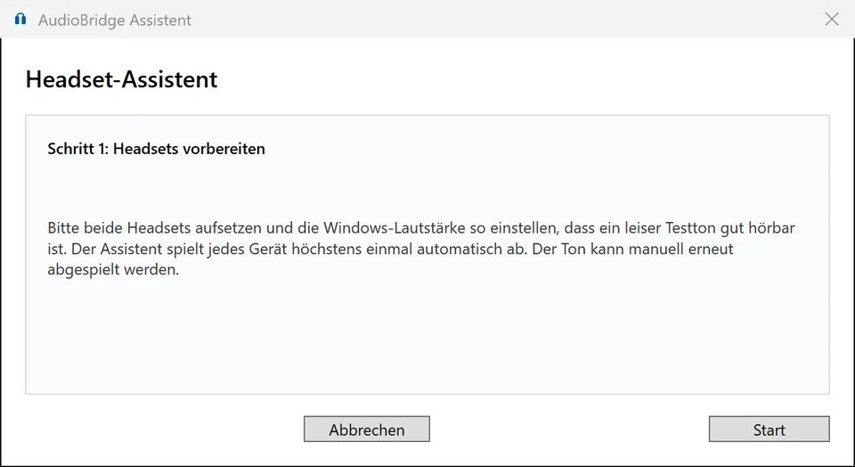 AudioBridge Headset-Assistent, Schritt 1: beide Headsets aufsetzen und die Windows-Lautstärke einstellen
